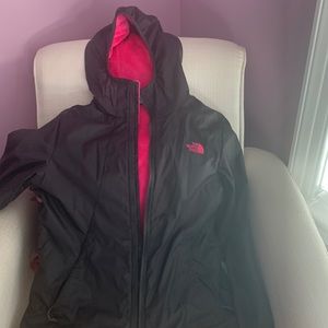 North Face light weight jacket. Black with pink lining.